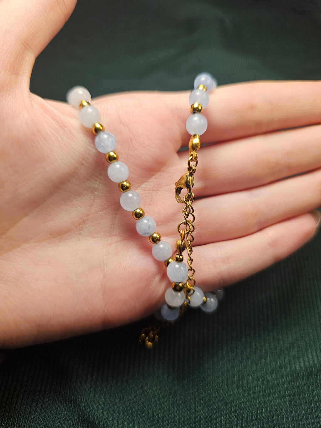 Blue and gold bead necklace