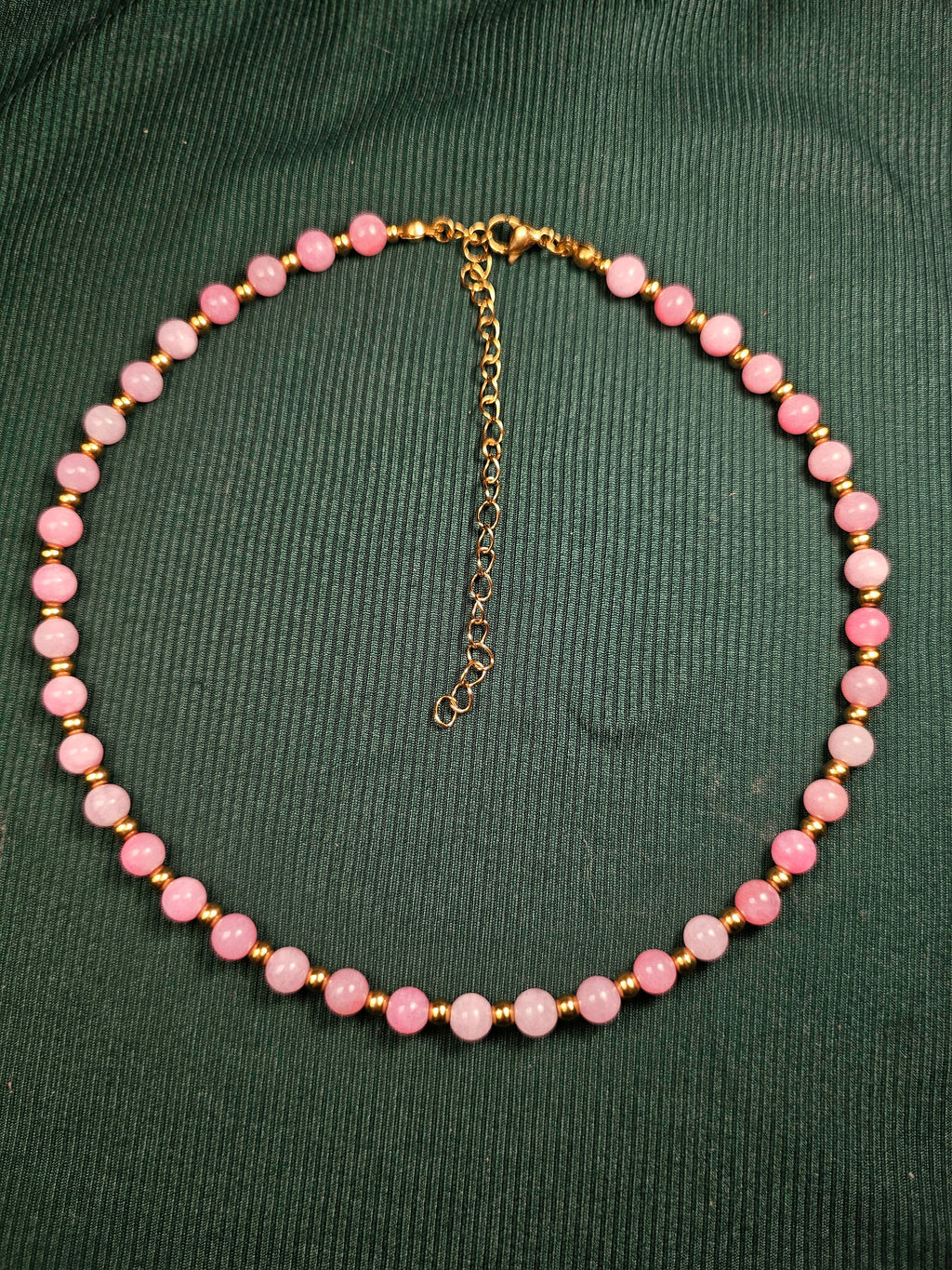 Pink and gold bead necklace