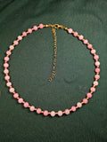Pink and gold bead necklace