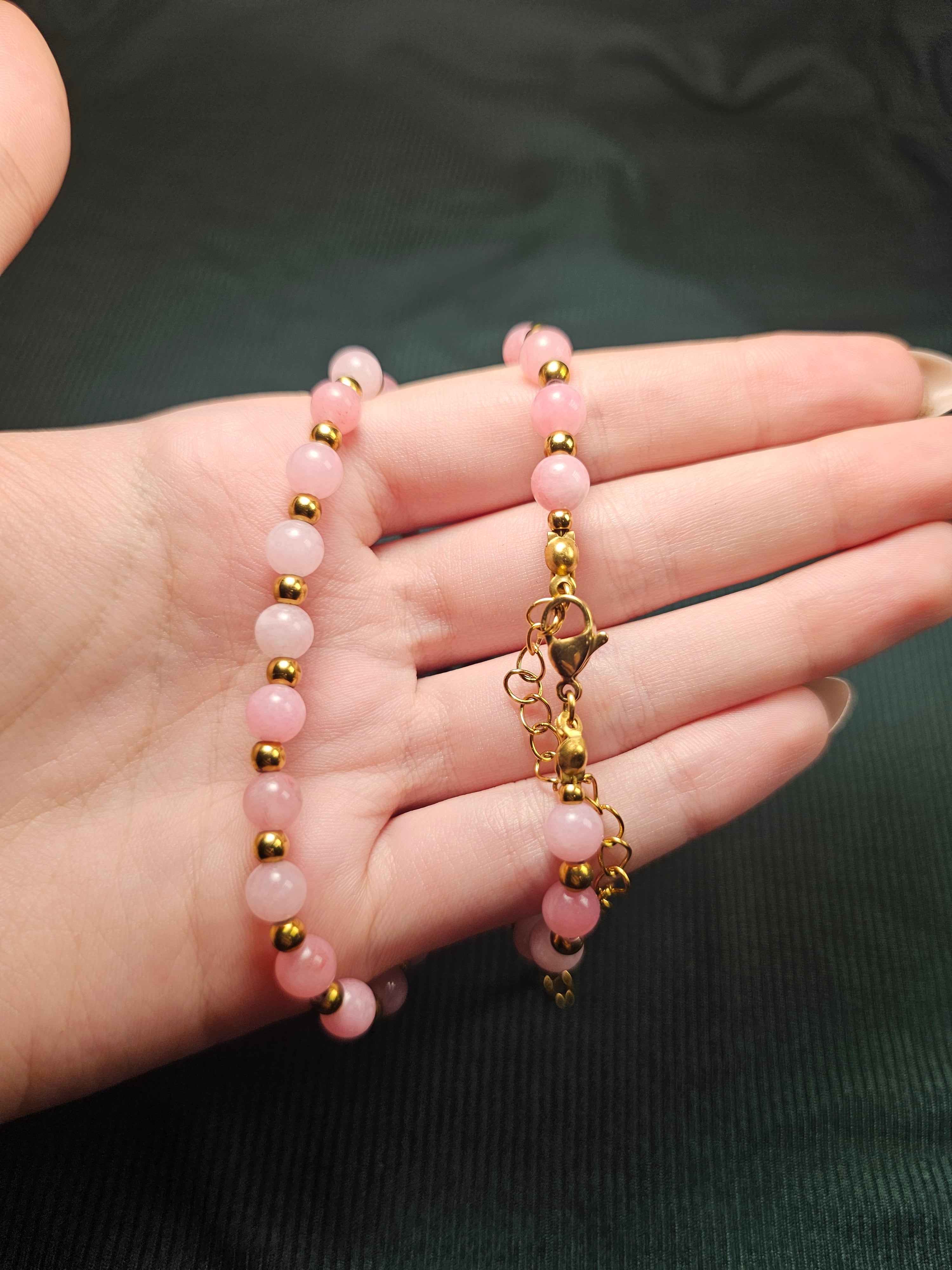 Pink and gold bead necklace