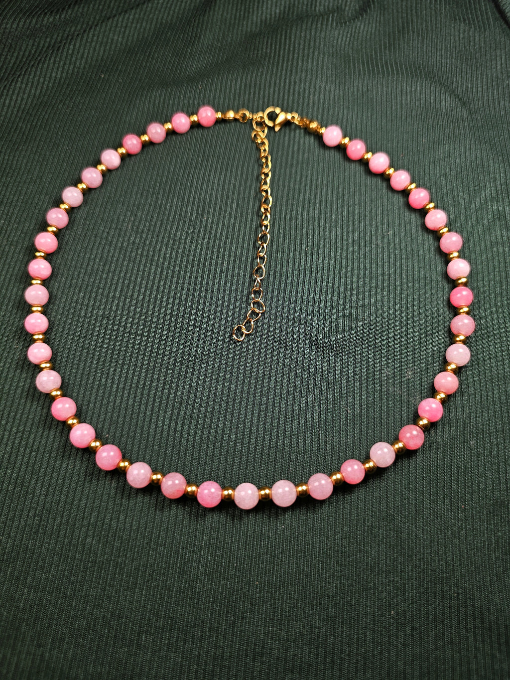 Pink and gold bead necklace