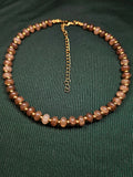 Crackle brown and black glass and gold bead necklace