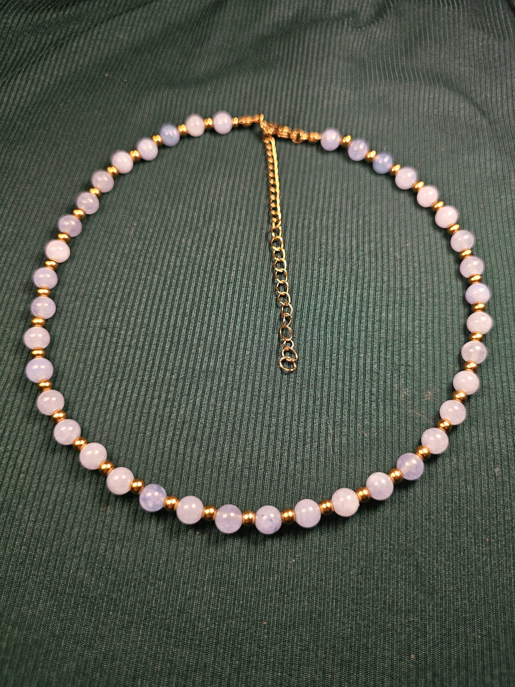 Blue and gold bead necklace