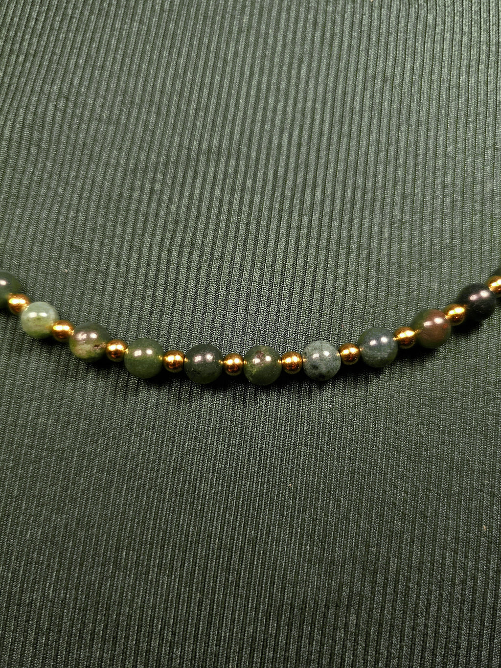 Green and gold bead necklace