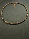 Green and gold bead necklace
