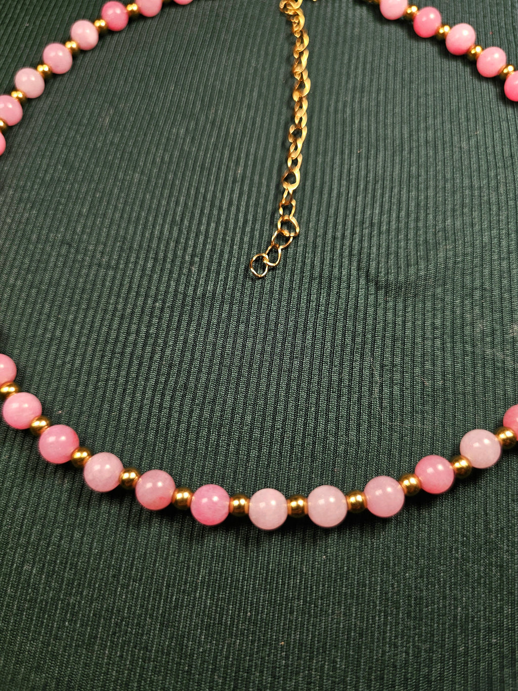 Pink and gold bead necklace
